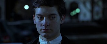 Movie still from “Wonder Boys” (2000), directed by Curtis Hanson – A person wearing a suit and tie; Close Up shot, Low angle