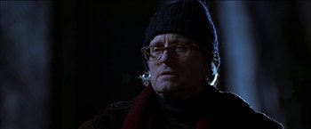 Movie still from “Wonder Boys” (2000), directed by Curtis Hanson – An older woman wearing glasses and a black hat; Close Up shot, Low angle