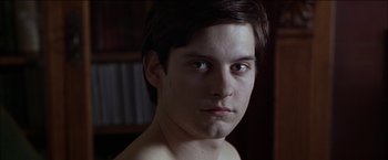 Movie still from “Wonder Boys” (2000), directed by Curtis Hanson – A young man is looking into the camera; Close Up shot, Low angle