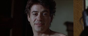 Movie still from “Wonder Boys” (2000), directed by Curtis Hanson – A man's chest and chest hair; Close Up shot, Over the shoulder angle