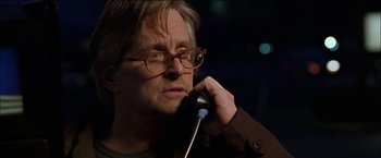 Movie still from “Wonder Boys” (2000), directed by Curtis Hanson – A person talking on a phone; Close Up shot, Low angle