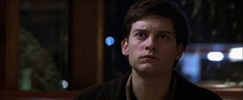 Movie still from “Wonder Boys” (2000), directed by Curtis Hanson – A young man is looking into the distance; Close Up shot, Low angle