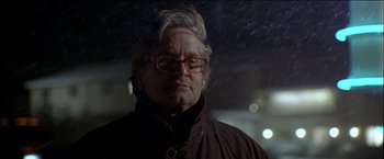 Movie still from “Wonder Boys” (2000), directed by Curtis Hanson – An older man wearing glasses and a brown jacket; Close Up shot, Low angle