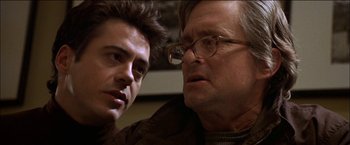 Movie still from “Wonder Boys” (2000), directed by Curtis Hanson – A man and a boy looking at one another; Close Up shot, Over the shoulder angle