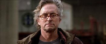 Movie still from “Wonder Boys” (2000), directed by Curtis Hanson – An older man wearing glasses and a brown jacket; Close Up shot, Low angle