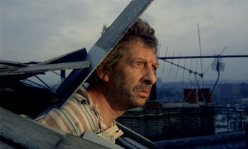 Movie still from “Wonderwall” (1968), directed by Joe Massot – A person looking at the camera; Close Up shot, Low angle