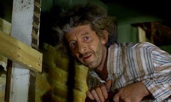 Movie still from “Wonderwall” (1968), directed by Joe Massot – An old man with a messy hair and beard; Close Up shot, Low angle