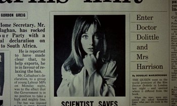 Movie still from “Wonderwall” (1968), directed by Joe Massot – A black - and - white photo of a woman in a newspaper; Extreme Close Up shot, Overhead angle