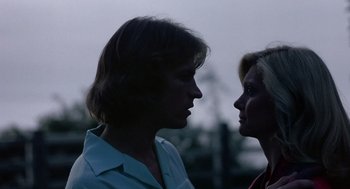 Movie still from “Xanadu” (1980), directed by Robert Greenwald – Two women face to face in a dark setting; Close Up shot, Low angle