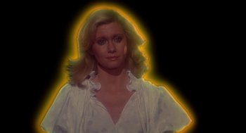 Movie still from “Xanadu” (1980), directed by Robert Greenwald – An image of a beautiful woman with blonde hair; Close Up shot, Low angle