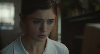 Movie still from “Yes, God, Yes” (2019), directed by Karen Maine – A young woman with blue eyes stares into the distance; Close Up shot, Over the shoulder angle
