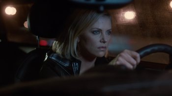 Movie still from “Young Adult” (2011), directed by Jason Reitman – Charlize theron sitting in the driver's seat of a car; Close Up shot, Over the shoulder angle