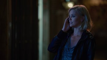 Movie still from “Young Adult” (2011), directed by Jason Reitman – A beautiful blonde woman talking on a cell phone; Close Up shot, Over the shoulder angle