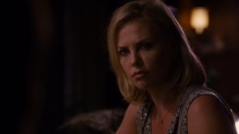 Movie still from “Young Adult” (2011), directed by Jason Reitman – A beautiful blond woman with a serious look on her face; Close Up shot, Over the shoulder angle