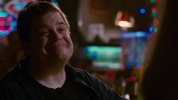 Movie still from “Young Adult” (2011), directed by Jason Reitman – A person sitting in a room; Close Up shot, Over the shoulder angle