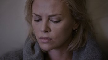 Movie still from “Young Adult” (2011), directed by Jason Reitman – A person with her eyes closed; Close Up shot, High angle