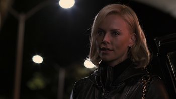 Movie still from “Young Adult” (2011), directed by Jason Reitman – A woman with blonde hair wearing a leather jacket; Close Up shot, Over the shoulder angle