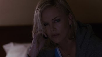 Movie still from “Young Adult” (2011), directed by Jason Reitman – A person sitting on a couch; Close Up shot, High angle