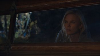 Movie still from “Young Adult” (2011), directed by Jason Reitman – A reflection of a woman in a mirror; Close Up shot, Over the shoulder angle