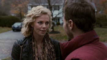 Movie still from “Young Adult” (2011), directed by Jason Reitman – A man and a woman talking to each other outside; Close Up shot, Over the shoulder angle