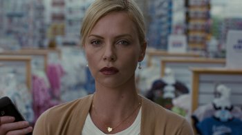 Movie still from “Young Adult” (2011), directed by Jason Reitman – Charlize theron in the movie a million ways to die in the west; Close Up shot, Over the shoulder angle
