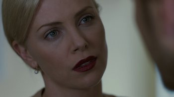 Movie still from “Young Adult” (2011), directed by Jason Reitman – A woman's face with red lipstick; Close Up shot, Over the shoulder angle
