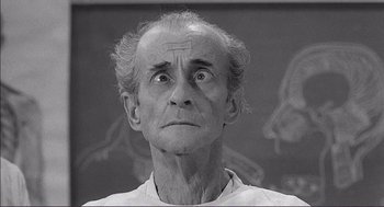 Movie still from “Young Frankenstein” (1974), directed by Mel Brooks – An old man with a surprised look on his face; Close Up shot, Low angle