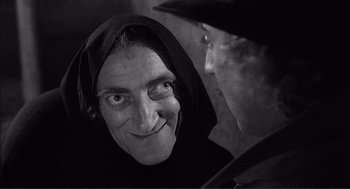 Movie still from “Young Frankenstein” (1974), directed by Mel Brooks – An old man and a woman looking at each other; Close Up shot, Over the shoulder angle
