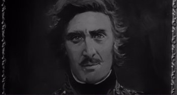 Movie still from “Young Frankenstein” (1974), directed by Mel Brooks – A black and white painting of a man with a mustache; Close Up shot, Low angle