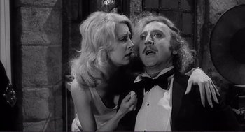 Movie still from “Young Frankenstein” (1974), directed by Mel Brooks – A man and a woman are looking at each other; Medium shot, Low angle