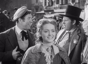 Movie still from “Young Mr. Lincoln” (1939), directed by John Ford – An old black and white photo of a man and a woman; Medium shot, Over the shoulder angle