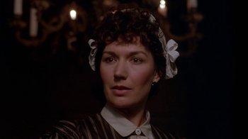 Movie still from “Young Sherlock Holmes” (1985), directed by Barry Levinson – A person wearing a hat; Close Up shot, High angle