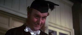 Movie still from “Young Winston” (1972), directed by Richard Attenborough – A person wearing a hat with a feather on it; Close Up shot, Low angle