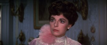 Movie still from “Young Winston” (1972), directed by Richard Attenborough – A person wearing a dress; Close Up shot, Over the shoulder angle