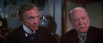 Movie still from “Young Winston” (1972), directed by Richard Attenborough – An older man looking at himself in the mirror; Close Up shot, Over the shoulder angle