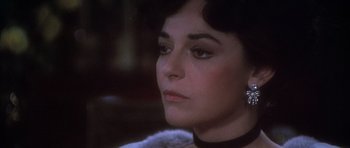 Movie still from “Young Winston” (1972), directed by Richard Attenborough – A person wearing a necklace; Close Up shot, High angle