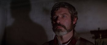 Movie still from “Young Winston” (1972), directed by Richard Attenborough – A person with a beard; Close Up shot, Low angle