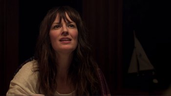 Movie still from “Your Sister's Sister” (2011), directed by Lynn Shelton – A person with long brown hair; Close Up shot, Over the shoulder angle
