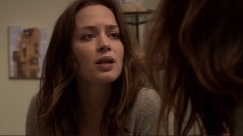 Movie still from “Your Sister's Sister” (2011), directed by Lynn Shelton – A woman looking at her reflection in a mirror; Close Up shot, Over the shoulder angle