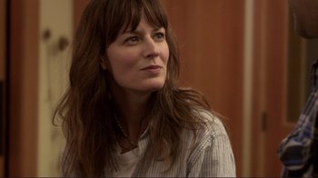 Movie still from “Your Sister's Sister” (2011), directed by Lynn Shelton – A person wearing a shirt; Close Up shot, Over the shoulder angle