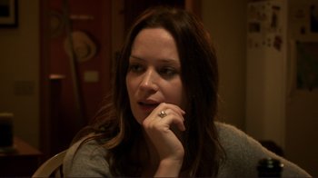 Movie still from “Your Sister's Sister” (2011), directed by Lynn Shelton – A woman sitting in front of a mirror with her hand on her chin; Close Up shot, Over the shoulder angle