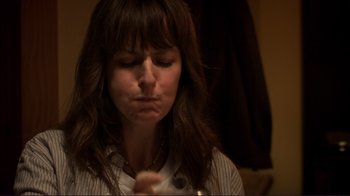 Movie still from “Your Sister's Sister” (2011), directed by Lynn Shelton – A person holding something in her hands; Close Up shot, Over the shoulder angle