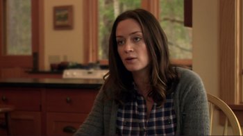 Movie still from “Your Sister's Sister” (2011), directed by Lynn Shelton – A woman sitting at a table in front of a window; Close Up shot, Over the shoulder angle