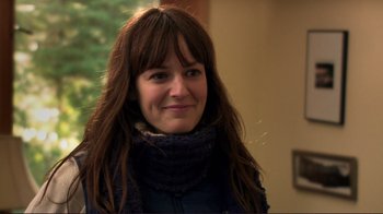 Movie still from “Your Sister's Sister” (2011), directed by Lynn Shelton – A person smiling at the camera; Close Up shot, Over the shoulder angle