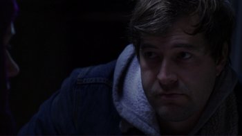 Movie still from “Your Sister's Sister” (2011), directed by Lynn Shelton – A person wearing a hooded jacket; Close Up shot, Over the shoulder angle