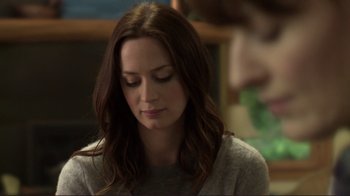 Movie still from “Your Sister's Sister” (2011), directed by Lynn Shelton – A person sitting in front of a window; Close Up shot, Over the shoulder angle