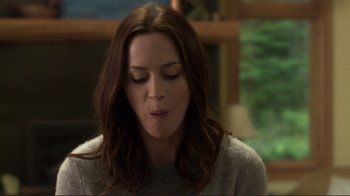 Movie still from “Your Sister's Sister” (2011), directed by Lynn Shelton – A person with her eyes closed; Close Up shot, Over the shoulder angle