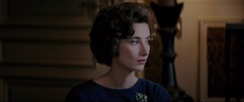 Movie still from “Yves Saint Laurent” (2014), directed by Jalil Lespert – A person wearing a blue shirt; Close Up shot, Over the shoulder angle