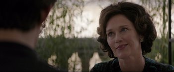 Movie still from “Yves Saint Laurent” (2014), directed by Jalil Lespert – A person wearing a black shirt; Close Up shot, Over the shoulder angle