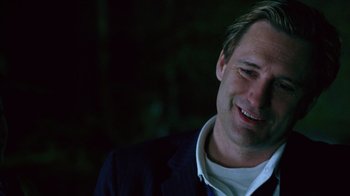 Movie still from “Zero Effect” (1998), directed by Jake Kasdan – A person wearing a jacket; Close Up shot, Over the shoulder angle